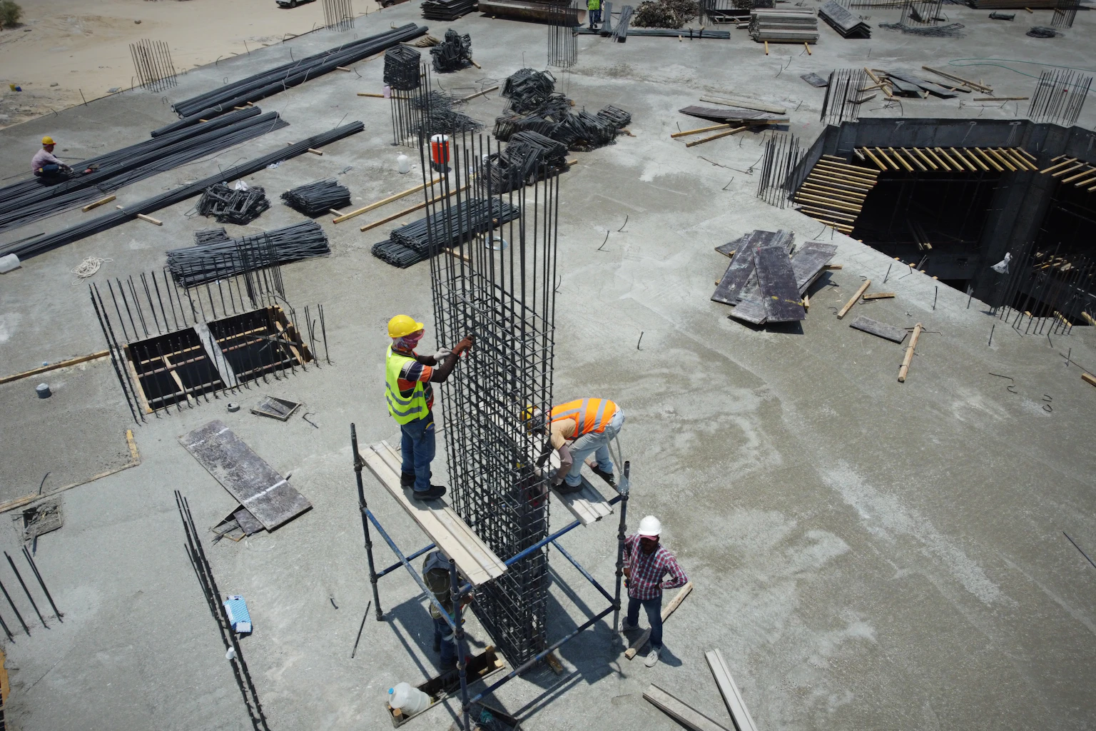 Workers on a large construction site